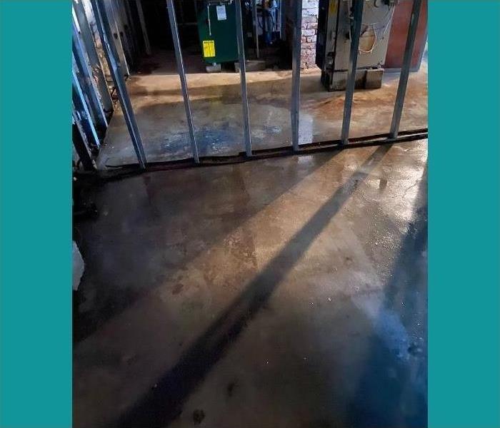 The basement floor in this Saratoga home after the water has been removed.