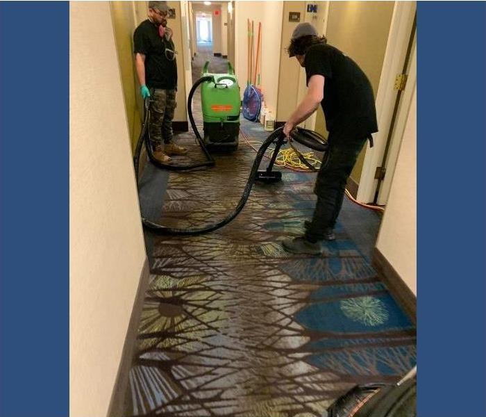 SERVPRO technicians clean up water damage in this Saratoga hotel.
